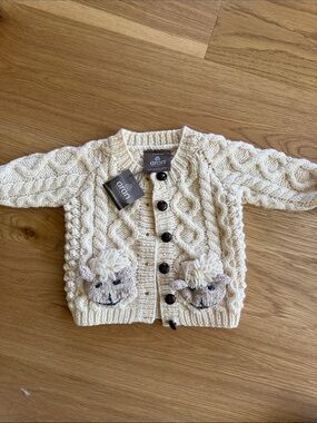Aran Irish handknit Cable Knit Cardigan with sheep pockets 6-12 months